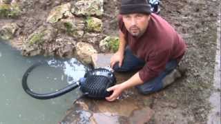 How to Build a Fish Pond and Stream  Cascade  Complete pond building video by Pondguru [upl. by Refynnej]