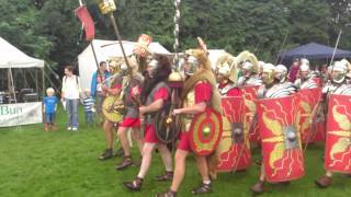 Roman Reenactment at the Amphitheatre in Caerleon Marching In [upl. by Ellenod]